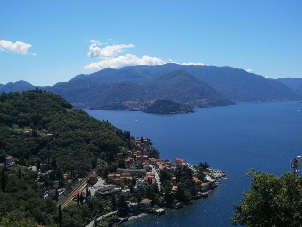 a view of a town on a lake with mountains at Casa Caterina in Varenna