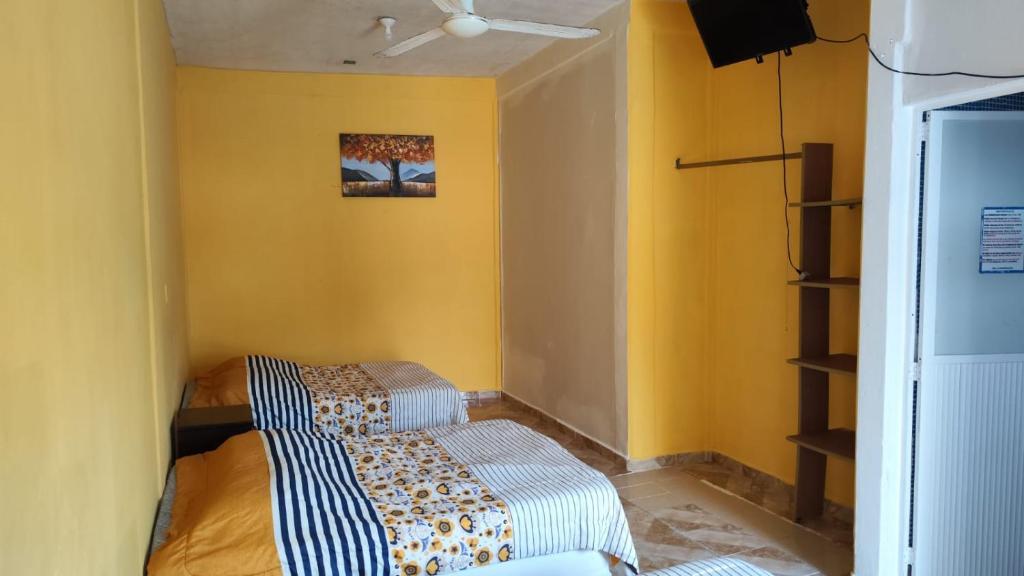Postel nebo postele na pokoji v ubytování Villas Yoleth Hotel