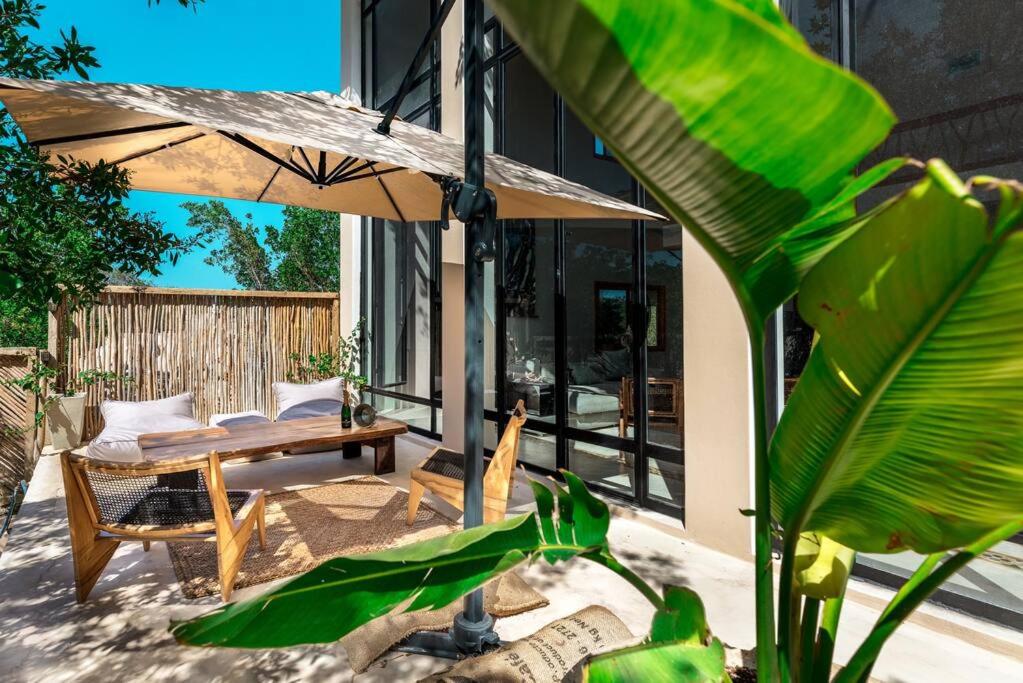 Patio nebo venkovní prostory v ubytování Impresionante villa en Holbox