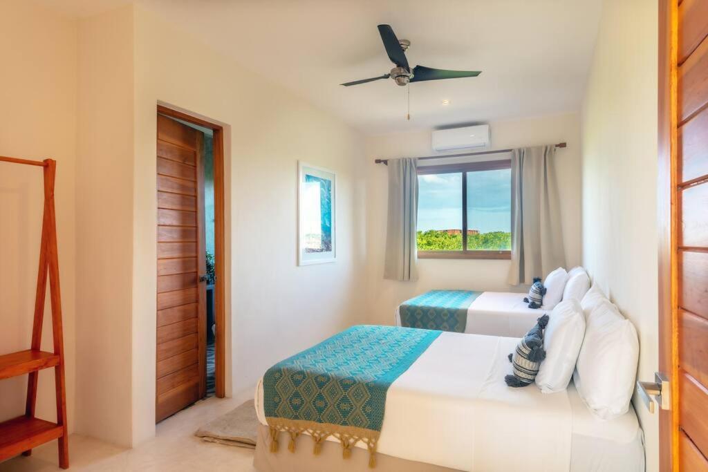 Postel nebo postele na pokoji v ubytování Impresionante villa en Holbox