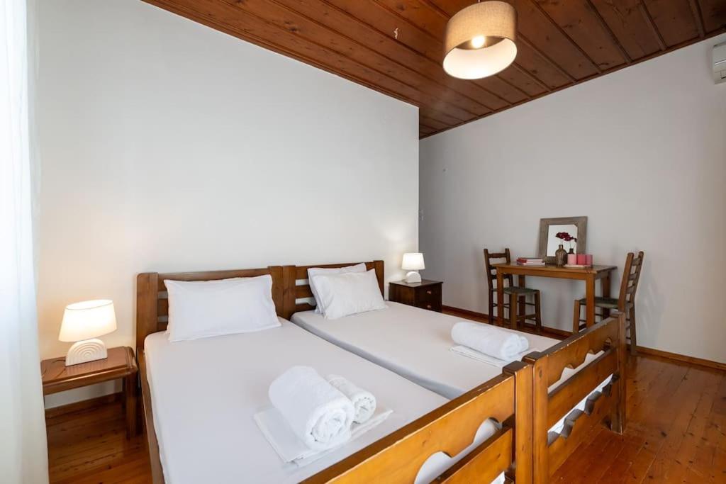 Postel nebo postele na pokoji v ubytování Chrysanthi apartments