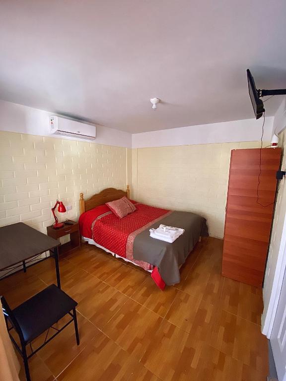Postel nebo postele na pokoji v ubytování Manantial