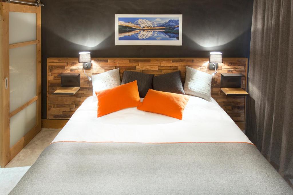Letto o letti in una camera di Hôtel Saint Charles Val Cenis