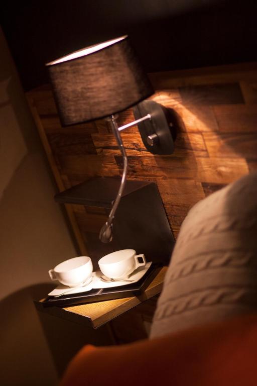 Letto o letti in una camera di Hôtel Saint Charles Val Cenis