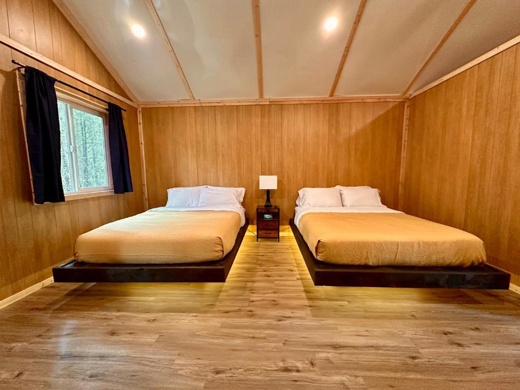 Postel nebo postele na pokoji v ubytování Roberts Lodge