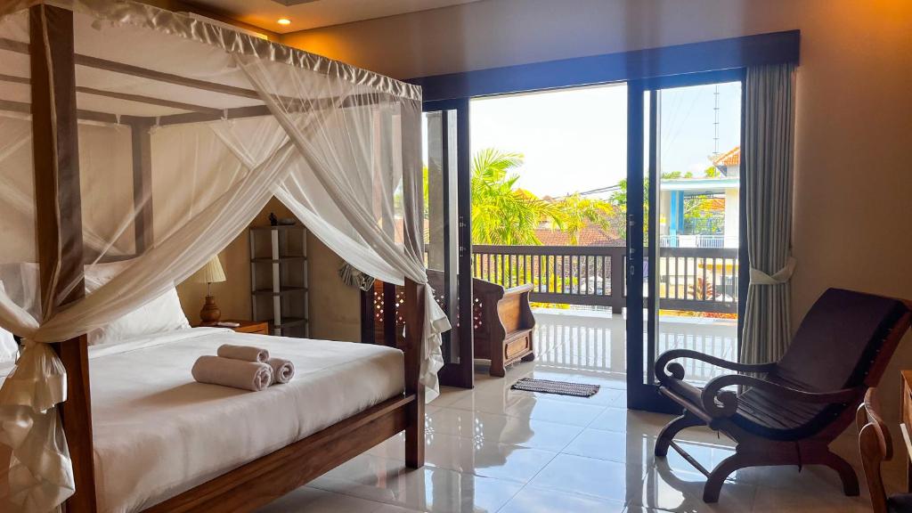 Postel nebo postele na pokoji v ubytování Wardana Ubud Villa