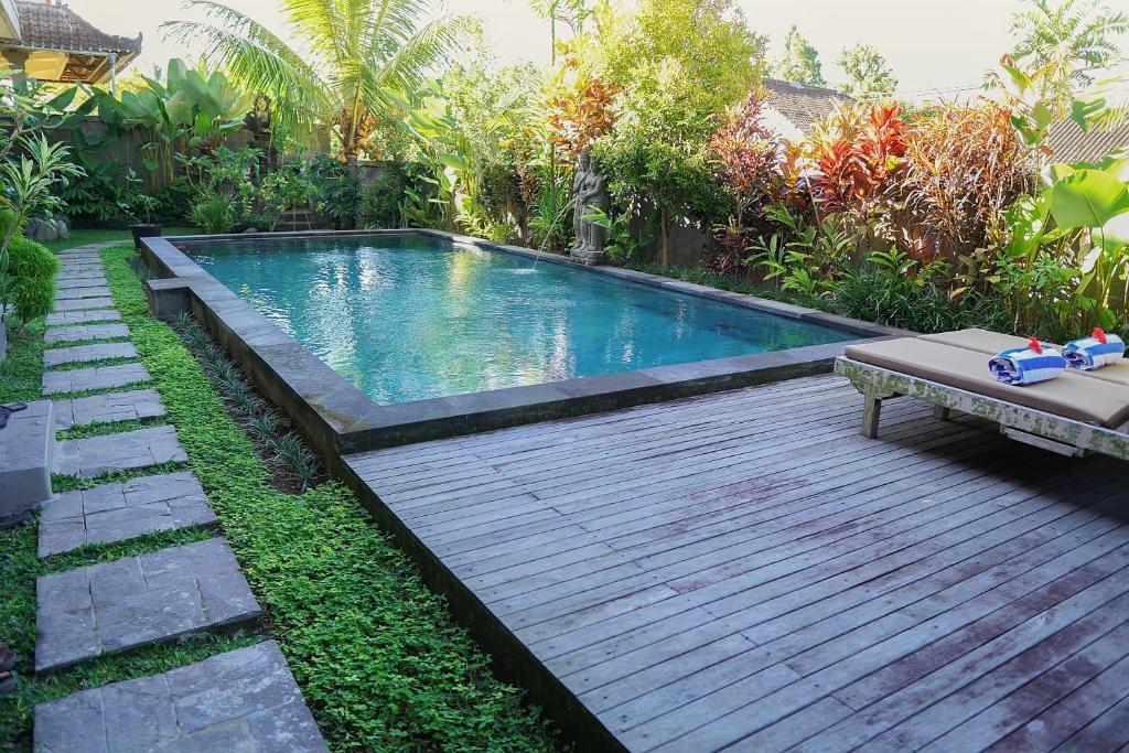 Bazén v ubytování Wardana Ubud Villa nebo v jeho okolí