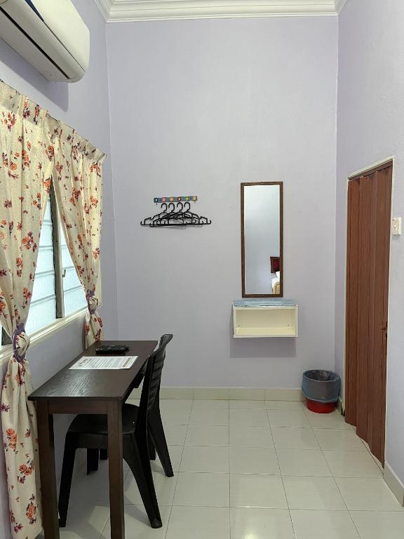 Fotografie z fotogalerie ubytování Rayyan's Roomstay v destinaci Pantai Kok