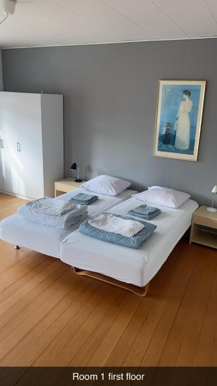 Postel nebo postele na pokoji v ubytování Byens Bed and Bath