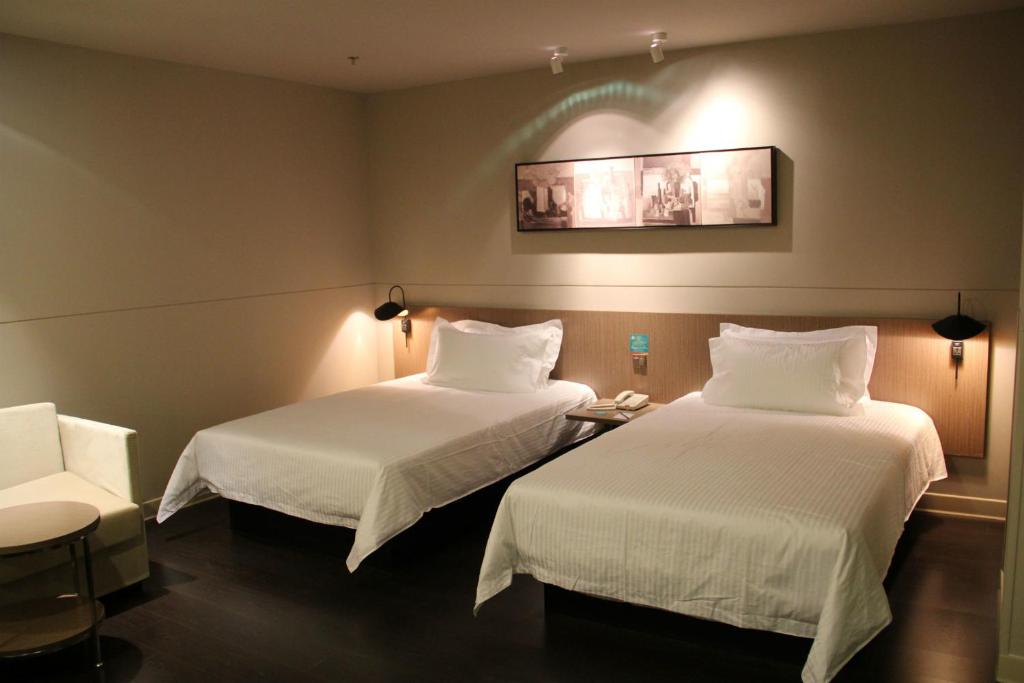 Vuode tai vuoteita majoituspaikassa Jinjiang Inn Shenyang Zhongshan Park