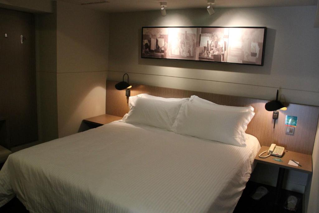 Vuode tai vuoteita majoituspaikassa Jinjiang Inn Shenyang Zhongshan Park