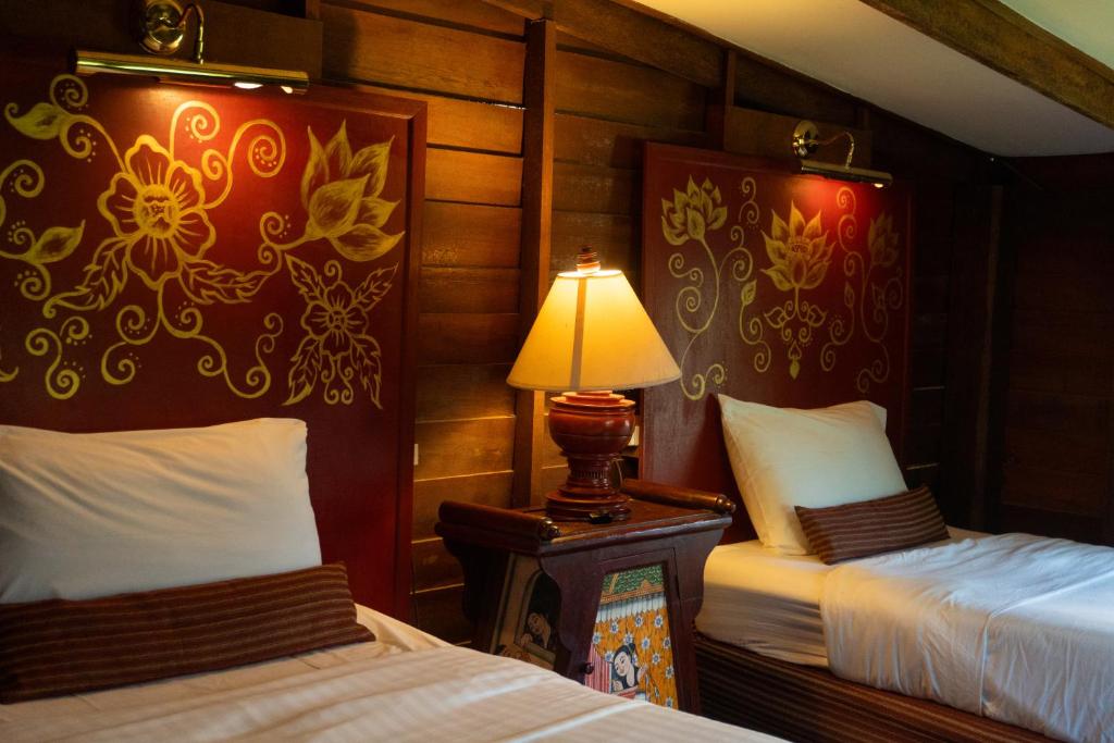 Ein Bett oder Betten in einem Zimmer der Unterkunft Leeloo Paradise