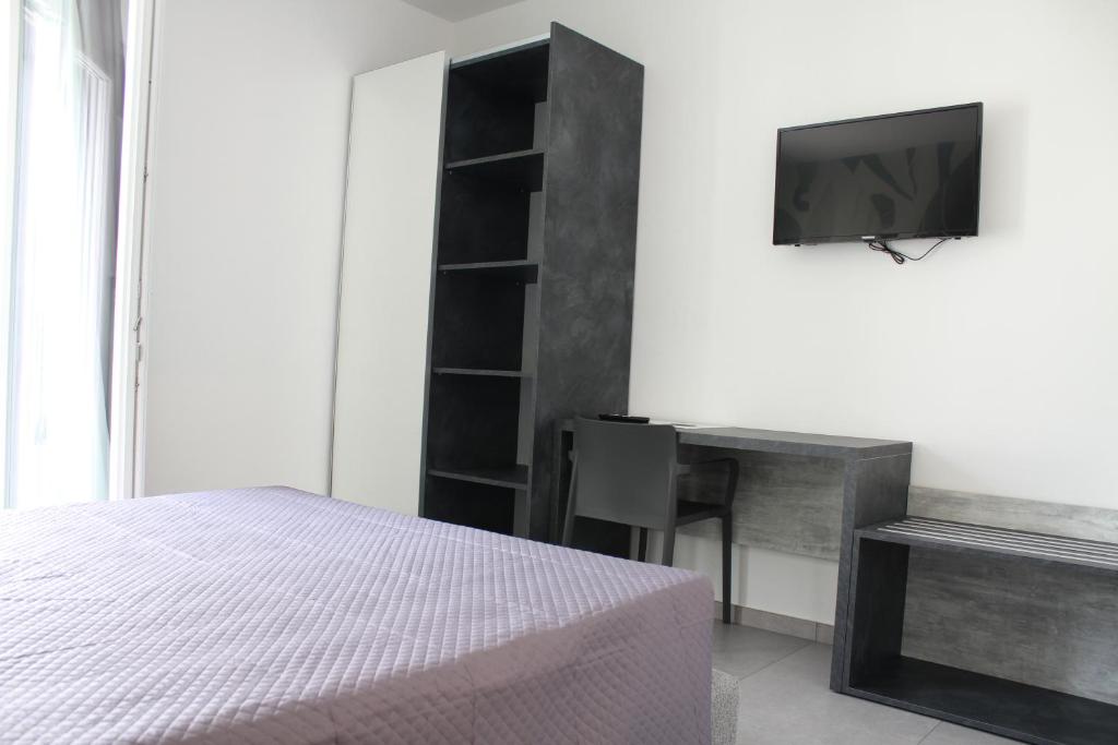 TV a/nebo společenská místnost v ubytování Hotel Paradiso
