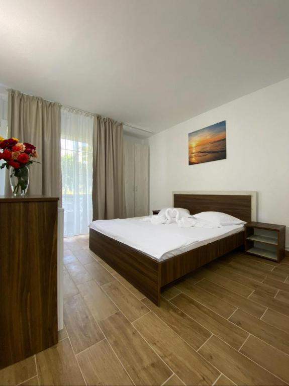 Postel nebo postele na pokoji v ubytování Hotel Rodica