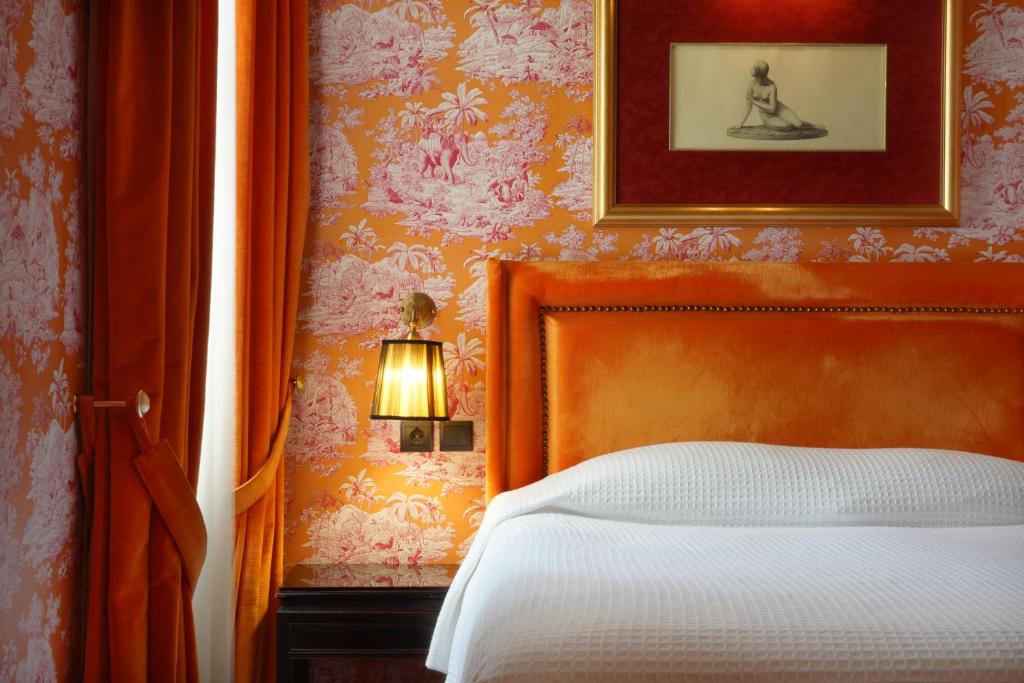 Posteľ alebo postele v izbe v ubytovaní Maison Grecque Hotel Extraordinaire