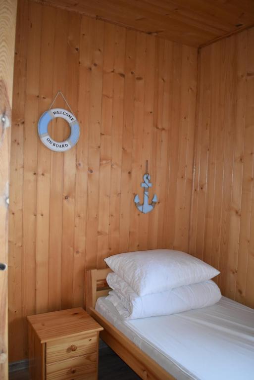 Postel nebo postele na pokoji v ubytování Promyk