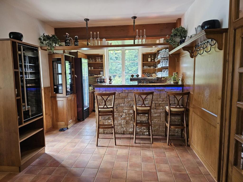 Kuchyň nebo kuchyňský kout v ubytování Hotel Konšel