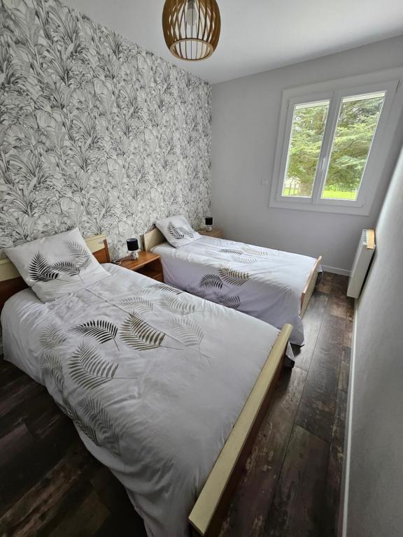 Postel nebo postele na pokoji v ubytování Bord de Loire