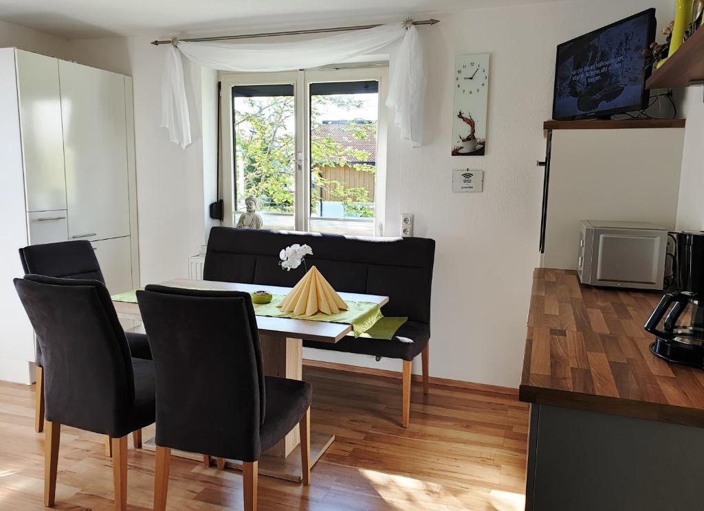 Televízia a/alebo spoločenská miestnosť v ubytovaní Ferienwohnung Mitterherzog
