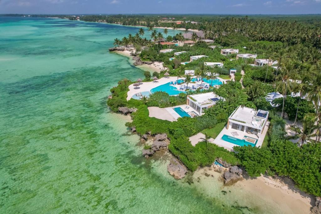 una vista aérea de un complejo en la playa en Ycona Eco-Luxury Resort, Zanzibar en Dikoni