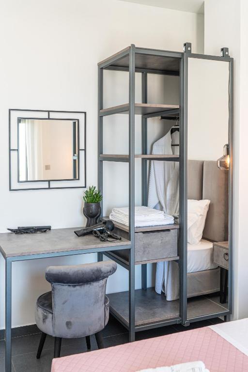 Postel nebo postele na pokoji v ubytování PNOẼ Luxury Apartments