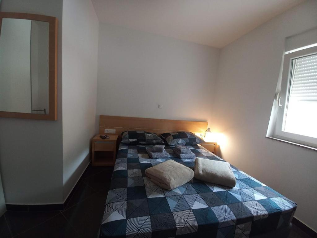 Postel nebo postele na pokoji v ubytování Villa Marija