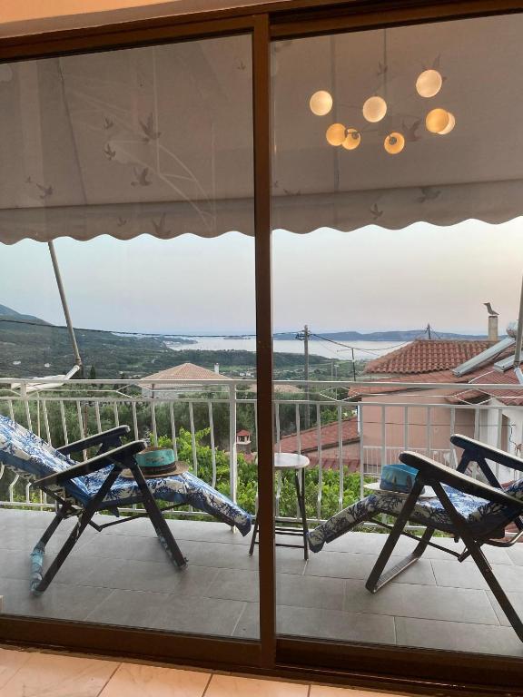 a view from the balcony of a house at Navarino Golden sunset Apartment in Pylos