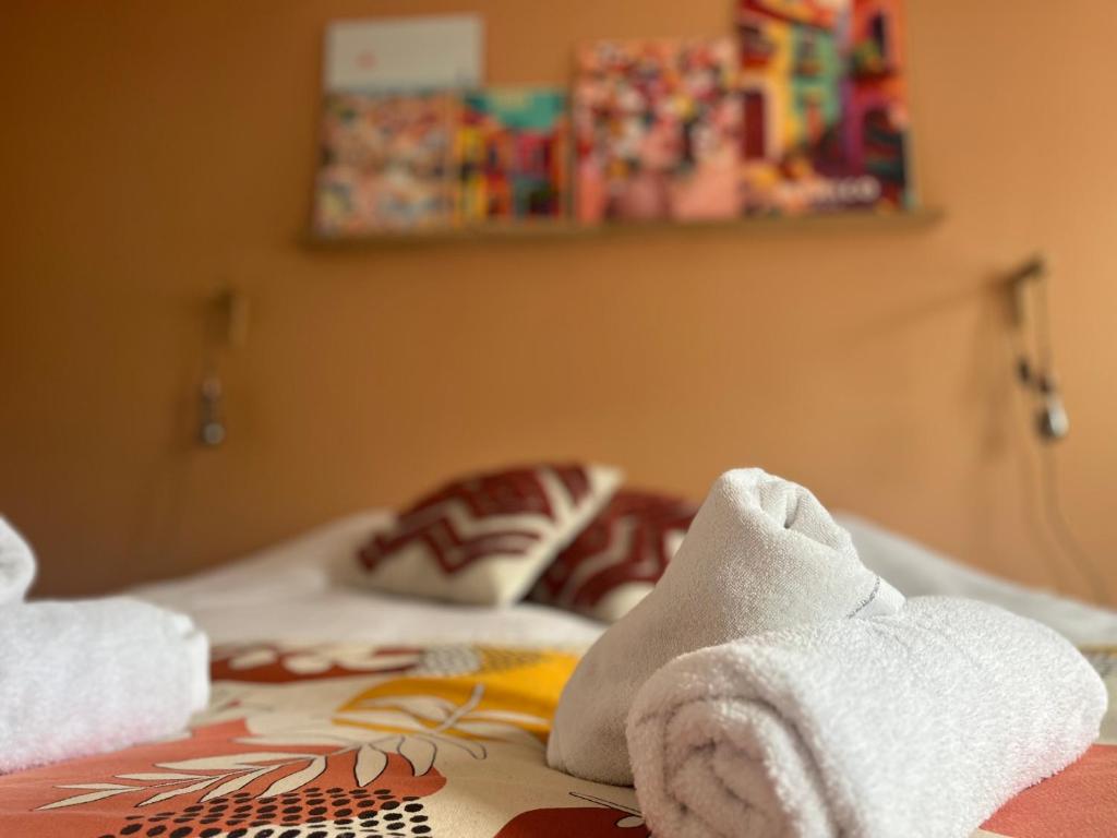 Postel nebo postele na pokoji v ubytování Gîte proche de Colmar et Kaysersberg pour 10 personnes