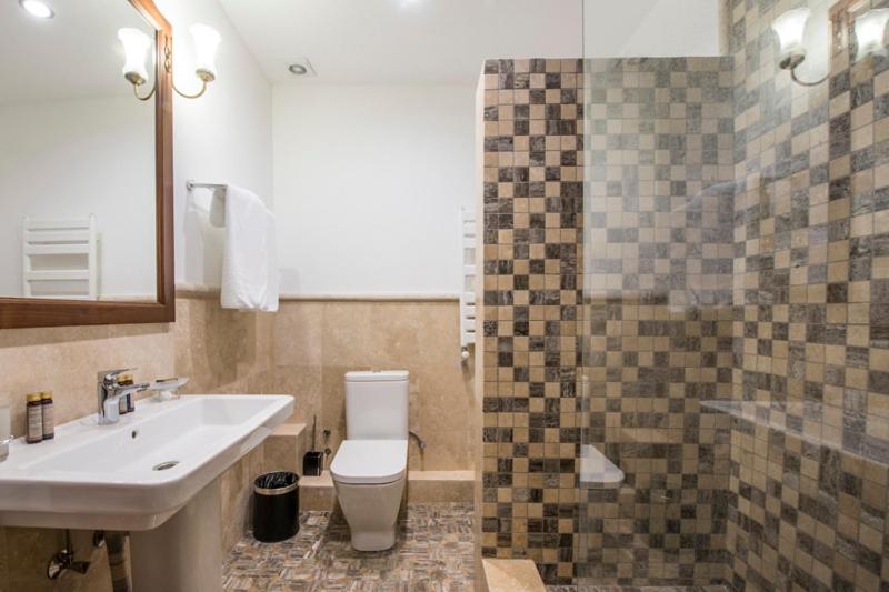 Koupelna v ubytování Hotel Kopala