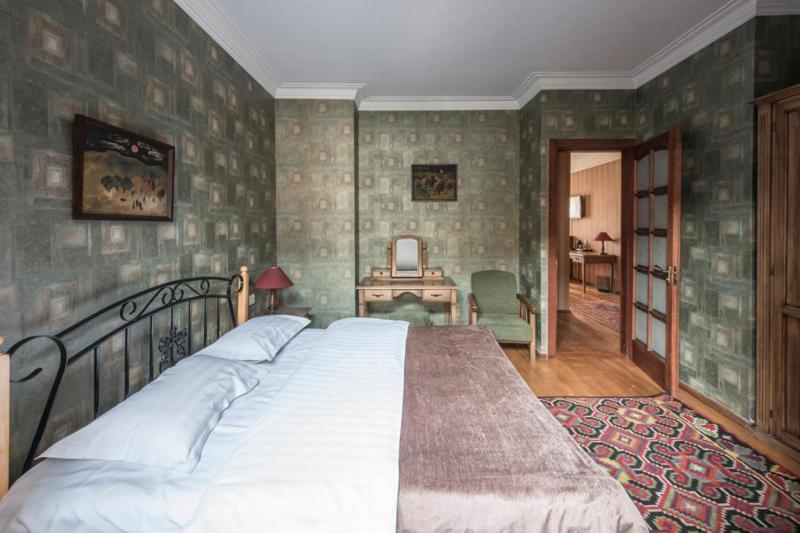 Postel nebo postele na pokoji v ubytování Hotel Kopala