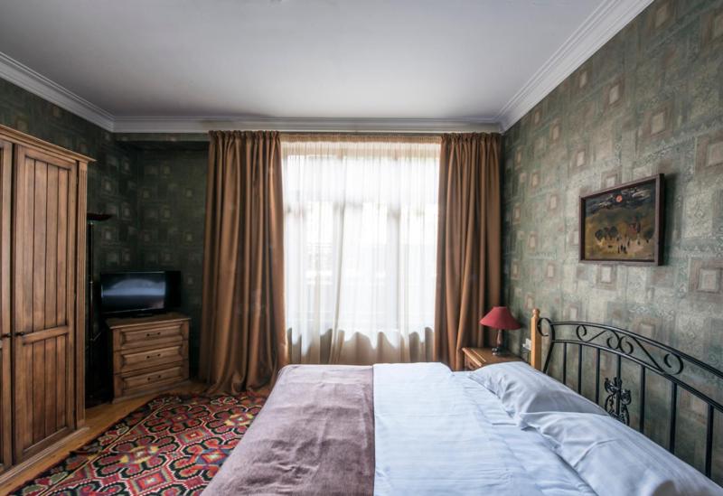 Postel nebo postele na pokoji v ubytování Hotel Kopala