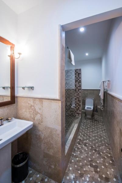 Koupelna v ubytování Hotel Kopala
