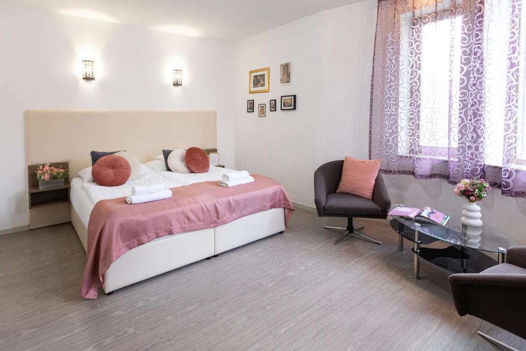 Posteľ alebo postele v izbe v ubytovaní Csillag Villa