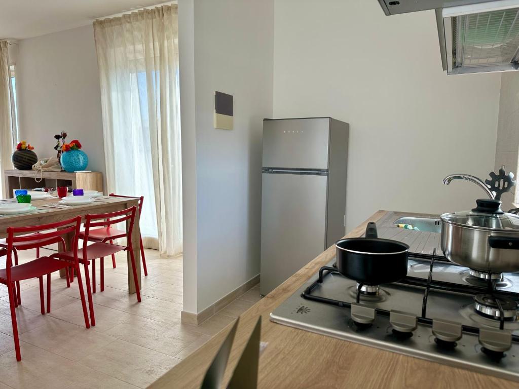A cozinha ou kitchenette de Attico al Sovrano - Nel cuore della Puglia!