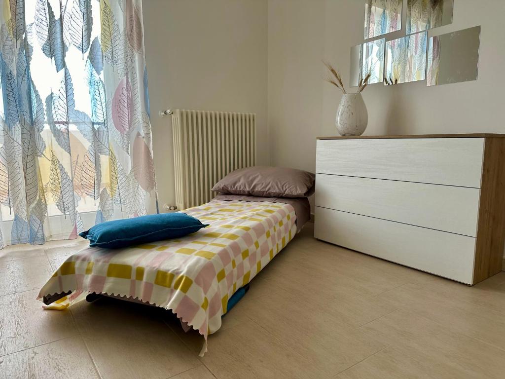 Uma cama ou camas num quarto em Attico al Sovrano - Nel cuore della Puglia!