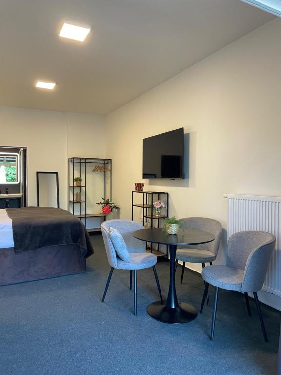 TV a/nebo společenská místnost v ubytování Hotel U Šuláka
