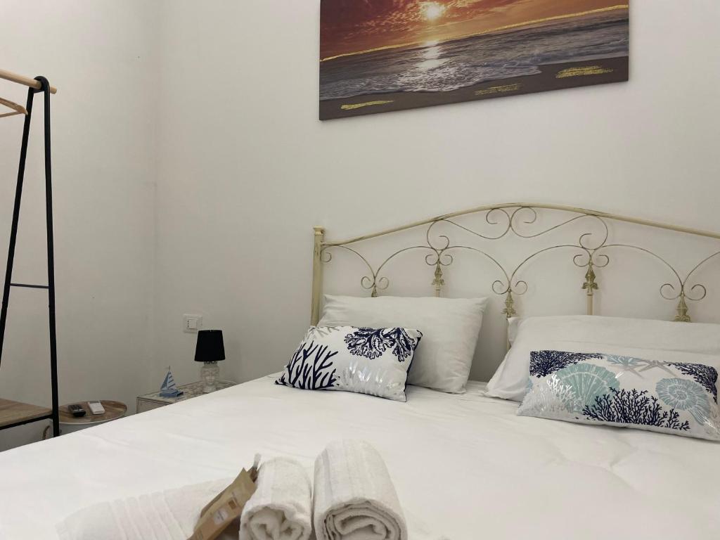 Postel nebo postele na pokoji v ubytování Luisa Room