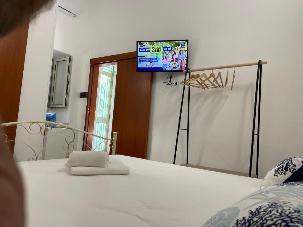 Postel nebo postele na pokoji v ubytování Luisa Room