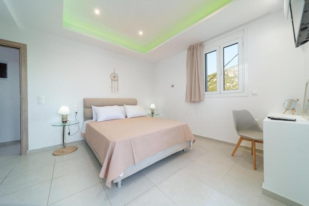 Postel nebo postele na pokoji v ubytování Iphigenia Apartments at Katelios