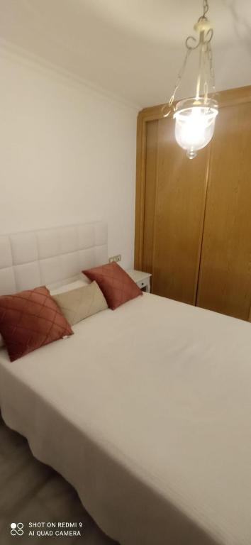 Posteľ alebo postele v izbe v ubytovaní Aparatamento Mirasol Fuengirola.