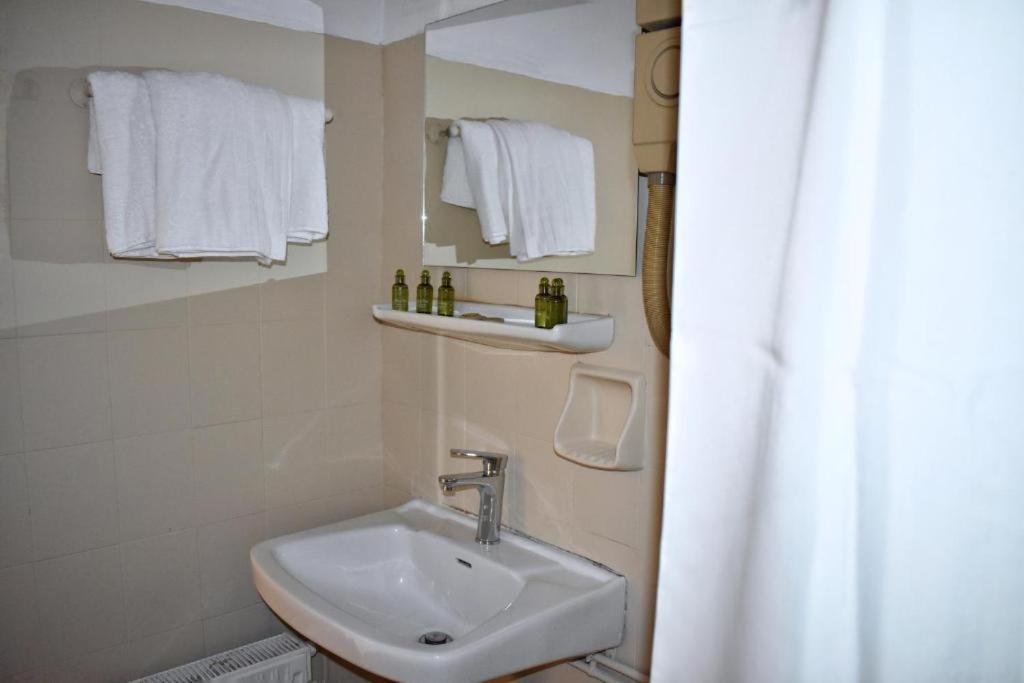 Koupelna v ubytování Hotel Theoxenia
