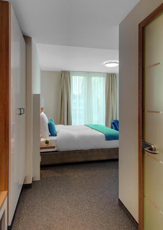Postel nebo postele na pokoji v ubytování Hotel und Pension Seereich
