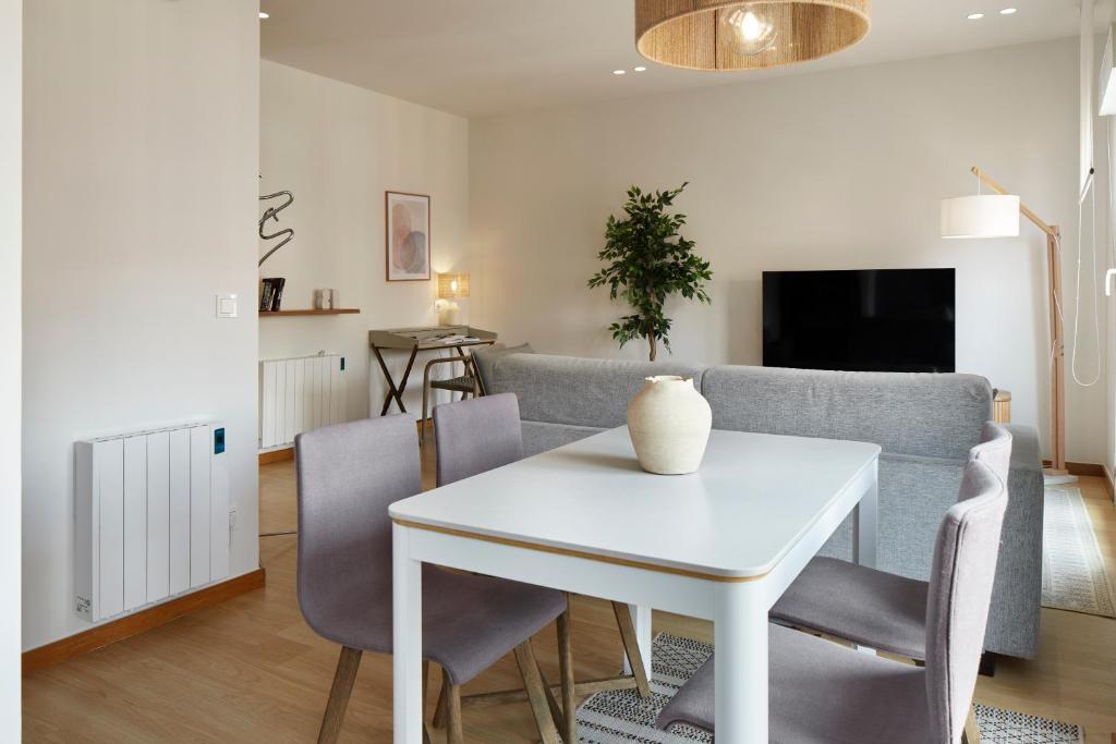 Televízia a/alebo spoločenská miestnosť v ubytovaní La Terraza by FeelFree Rentals