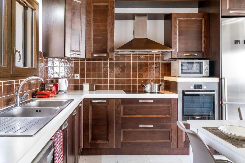 Kuchyňa alebo kuchynka v ubytovaní Remvi House