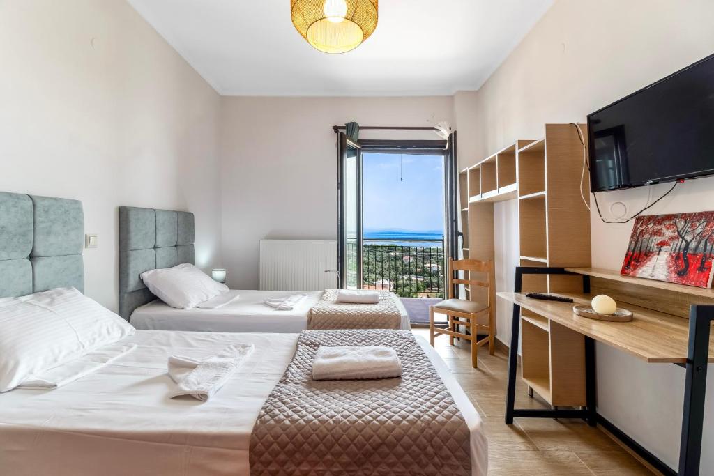 Posteľ alebo postele v izbe v ubytovaní Remvi House