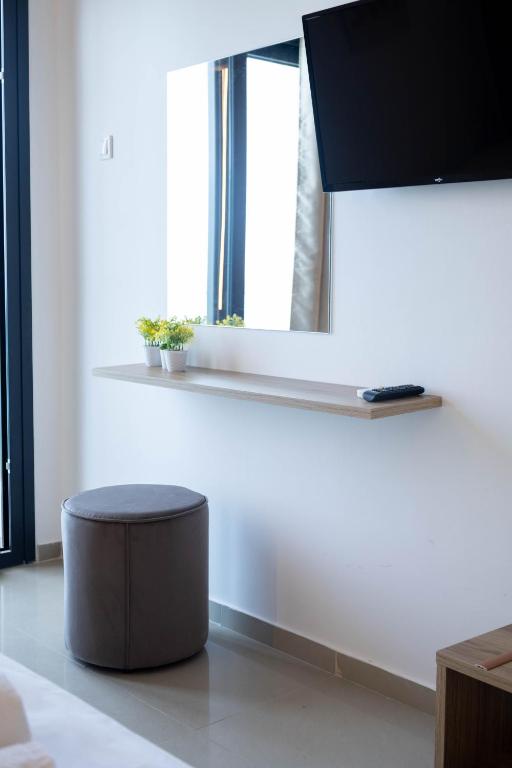 TV a/nebo společenská místnost v ubytování Hotel12