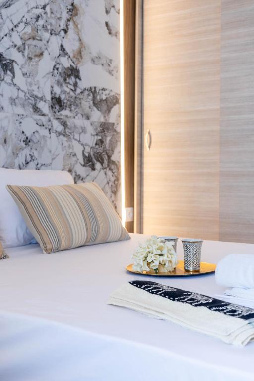 Postel nebo postele na pokoji v ubytování Hotel12