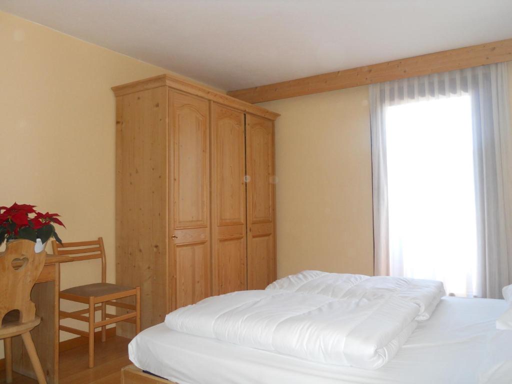 Łóżko lub łóżka w pokoju w obiekcie Park Hotel Miramonti