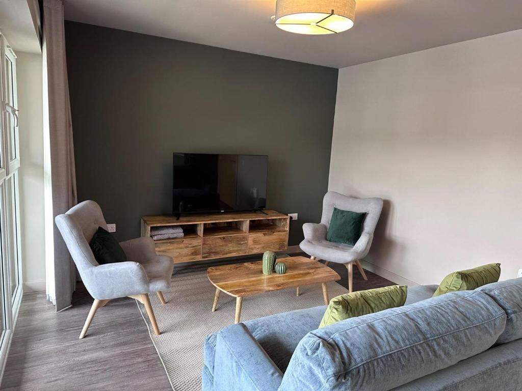 TV a/nebo společenská místnost v ubytování Harbourside Apartment No 1