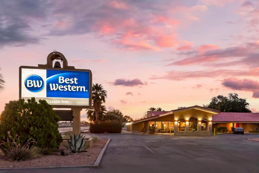 a sign in front of a best western motel at Best Western Mission Inn in Las Cruces